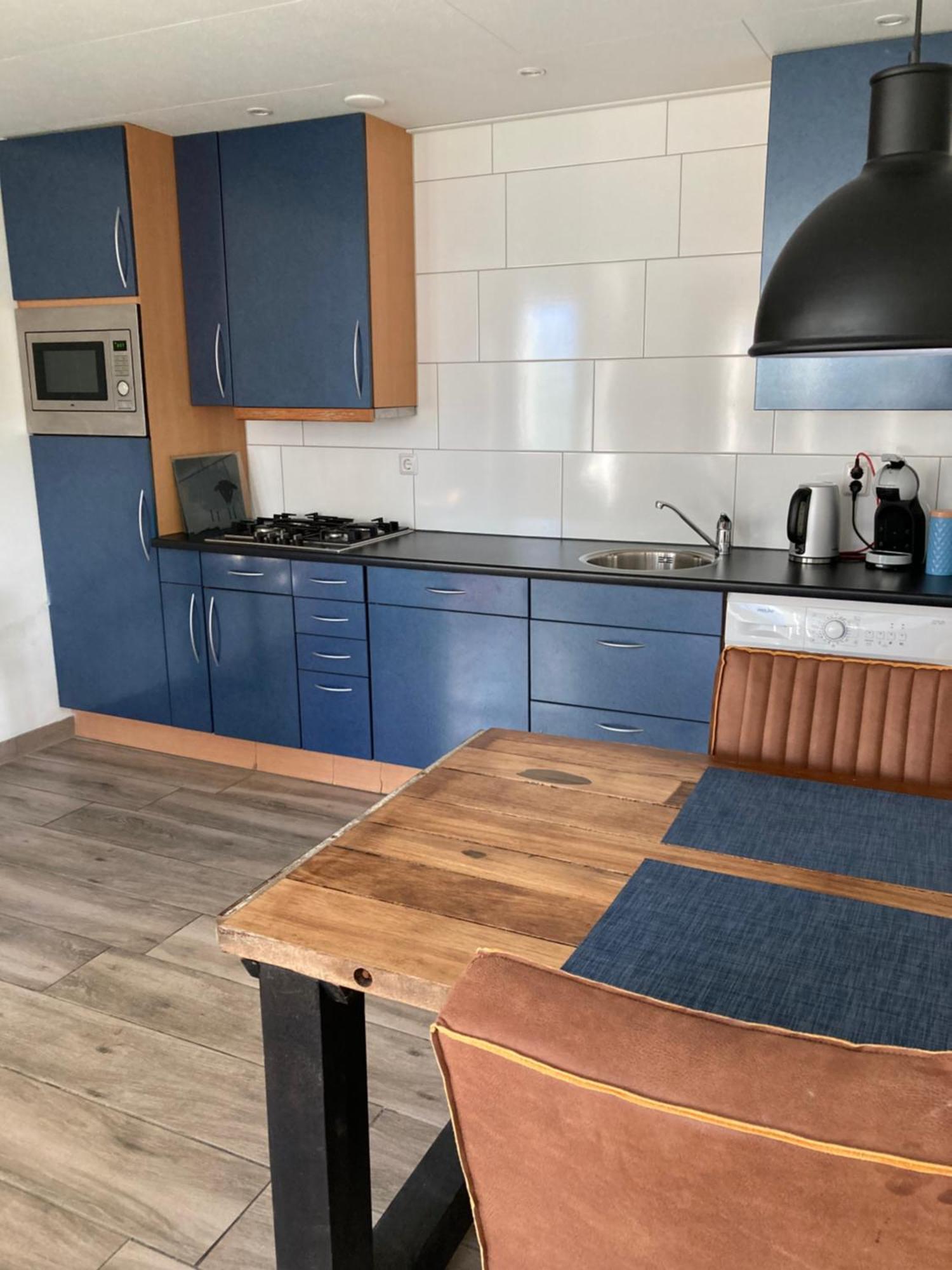 Bungalow Op Bedrijf Met Melkkoeien De Cocksdorp  Eksteriør bilde